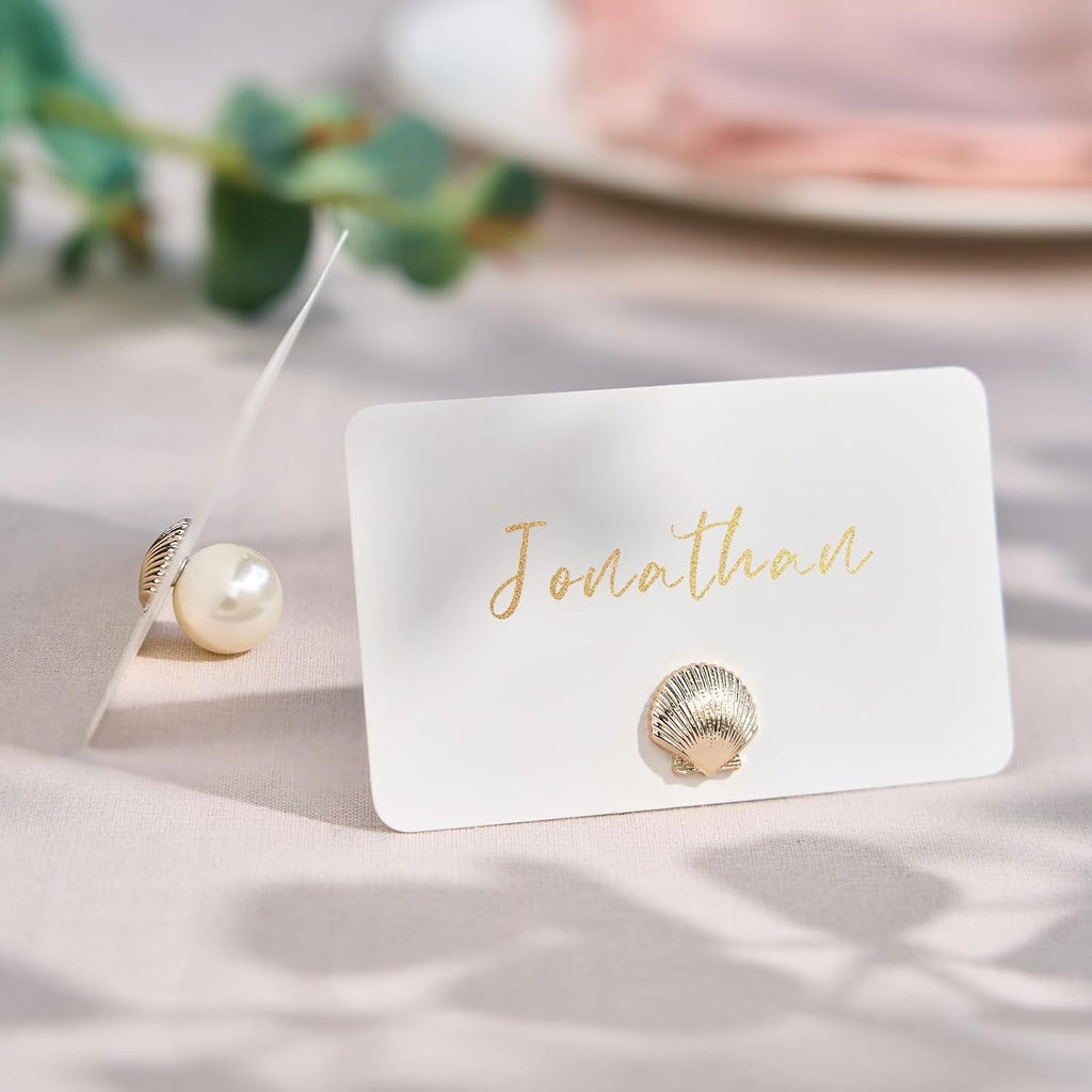 UNIQOOO 12Pcs Decorative Gold Shell Place Card Holders Bulk, Scallop Name Card Stands Set, for Beach Wedding Decor Coastal Favors, Table Setting, Business Card, Name Tag, Party Food Labels