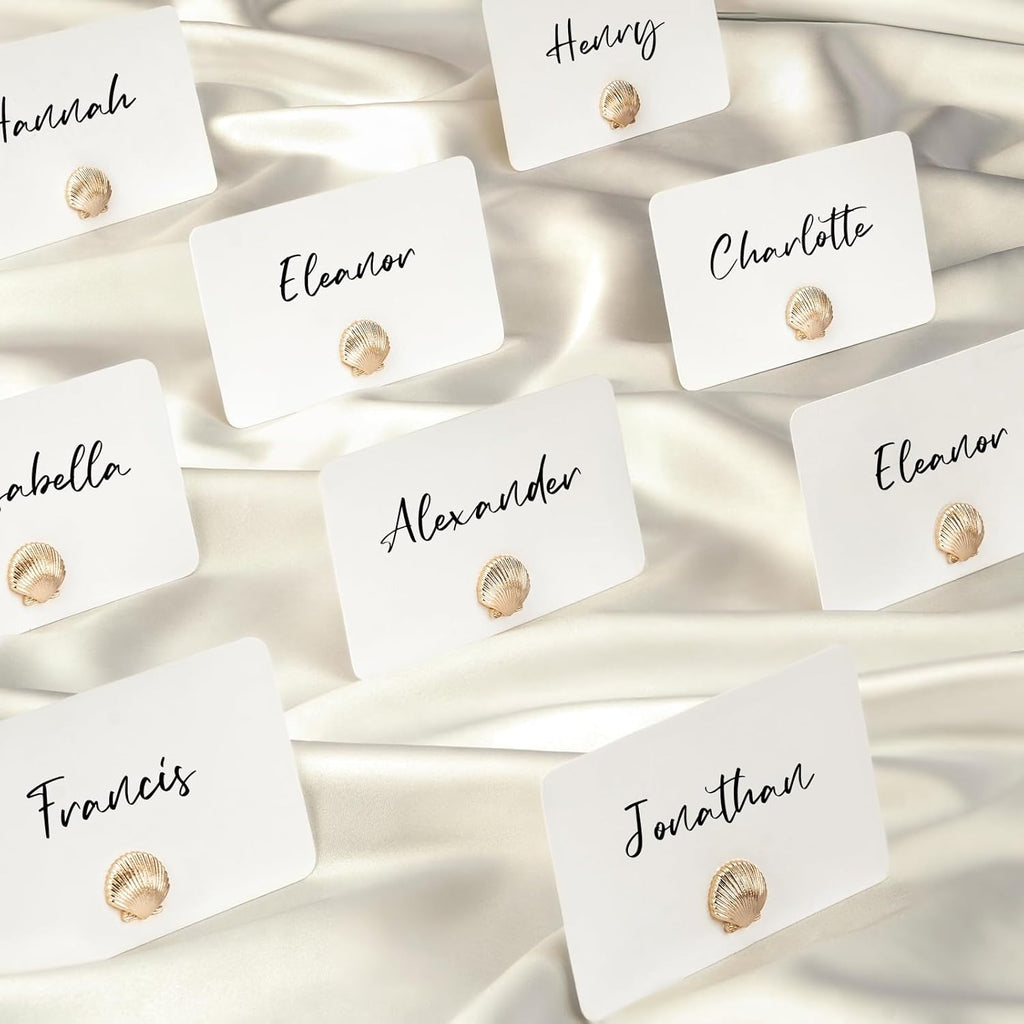UNIQOOO 24Pcs Decorative Gold Shell Place Card Holders Bulk, Scallop Name Card Stands Set, for Beach Wedding Decor Coastal Favors, Table Setting, Business Card, Name Tag, Party Food Labels